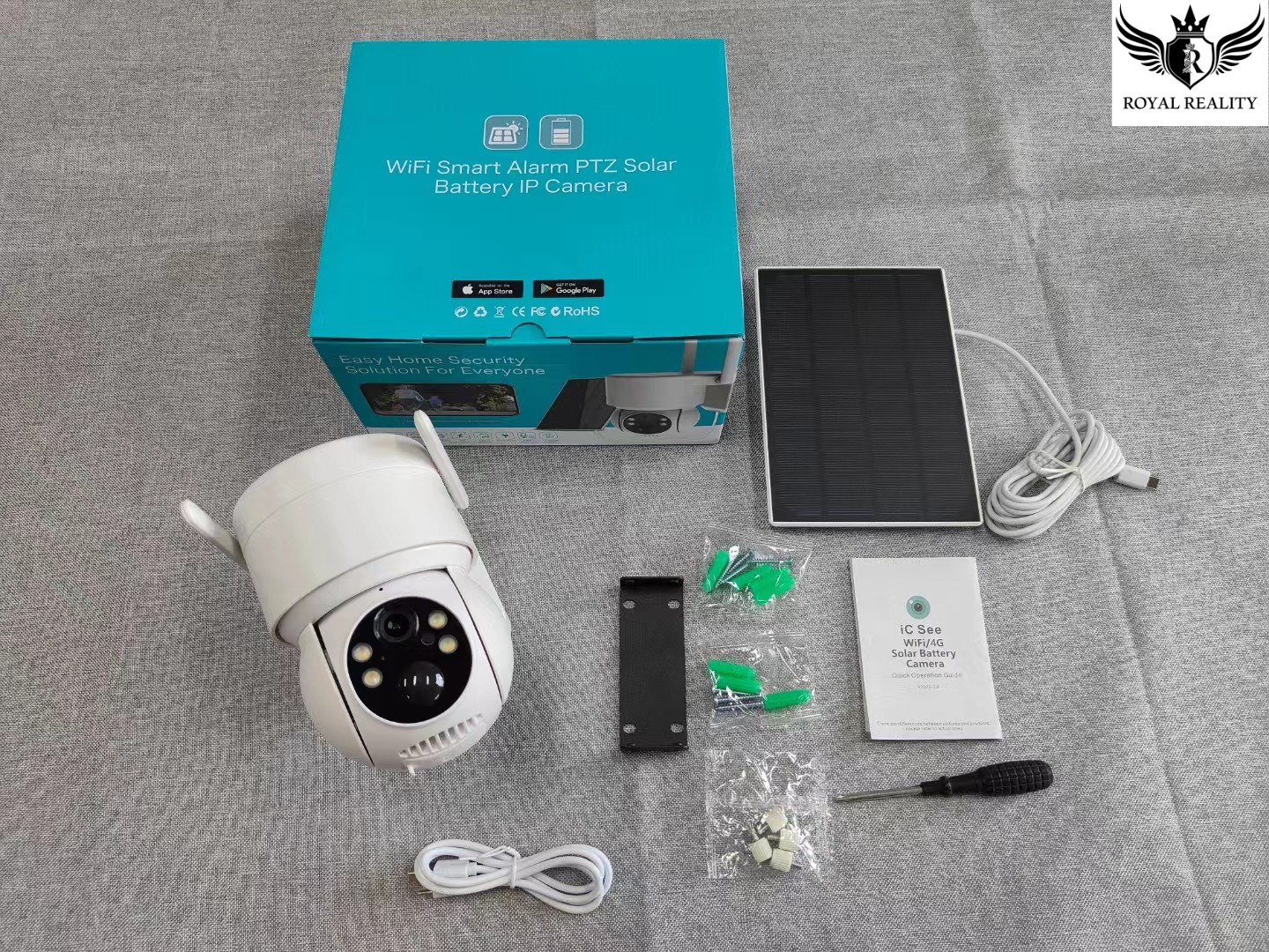 "Product packaging with solar security camera, manual, tools, and cables"