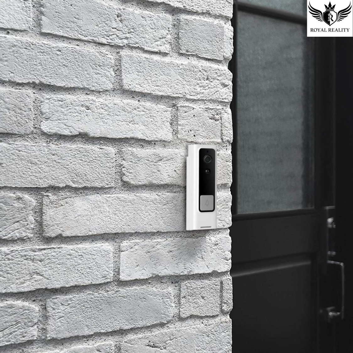 Smart doorbell mounted on a brick wall next to a door