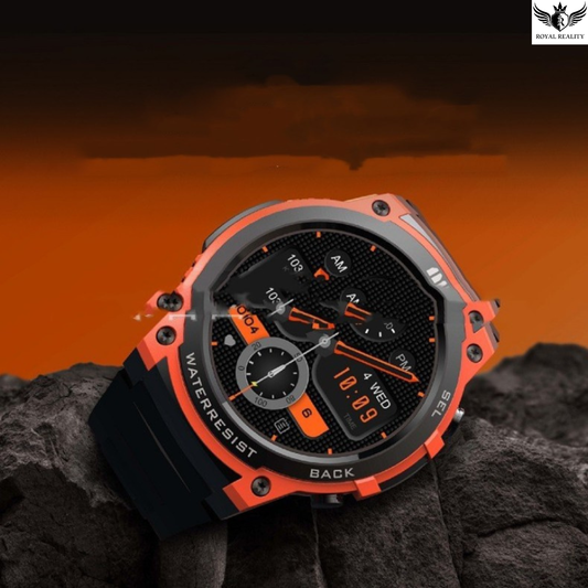 Orange and black watch on a dark surface with an orange gradient background