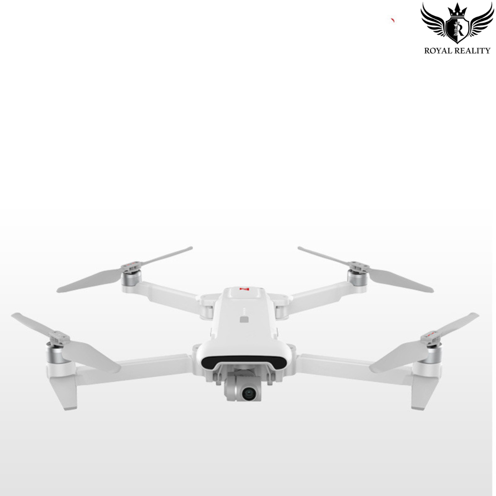 White 4K GPS drone with foldable arms, flying mid-air – Royal Reality branding