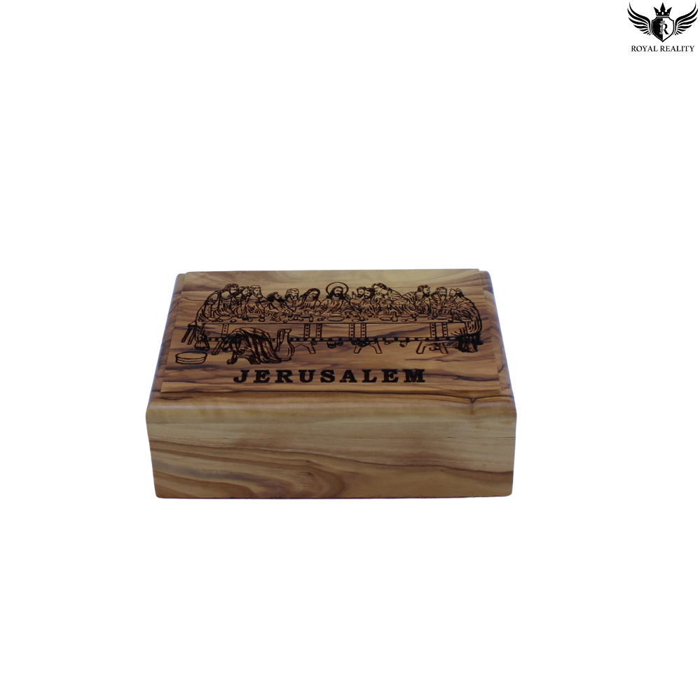 Wooden box with engraved design and 'Jerusalem' text on a white background