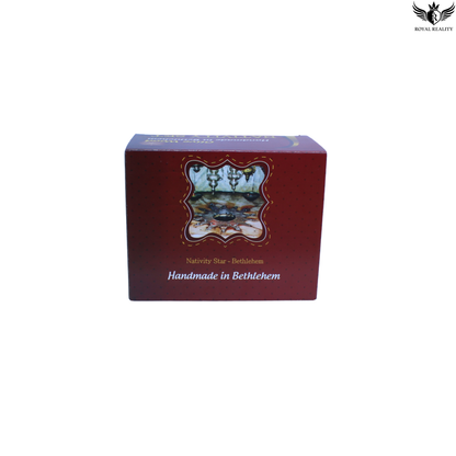 Red box with a Nativity scene design on a white background