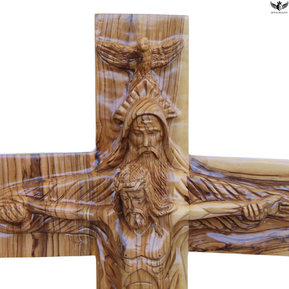 Wooden cross with detailed carvings on a white background