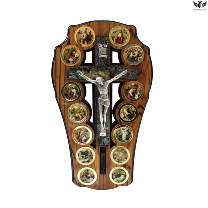 Wooden cross wall decoration with religious scenes and a central figure on a white background
