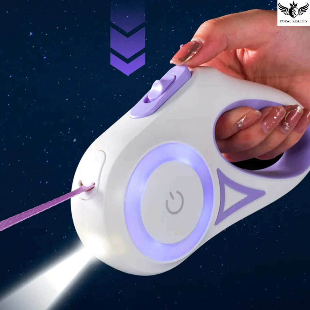 Hand holding a white and purple device with a laser beam on a dark background