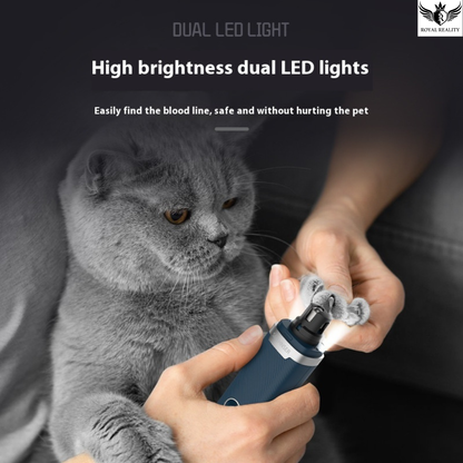 Pet owner trimming cat nails using Royal Reality™ Electric Nail Grinder – safe low-noise grooming too