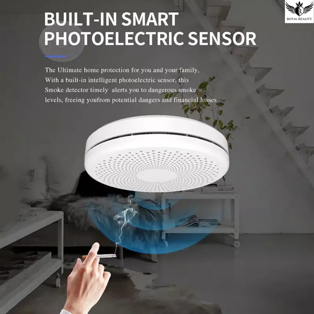 Smoke detector with photoelectric sensor in a home setting, showing smoke and a hand with a cigarette.
