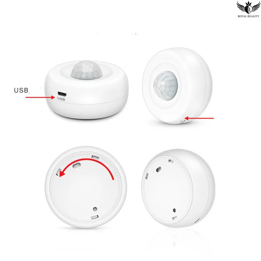 Four white motion sensors with USB ports on a white background