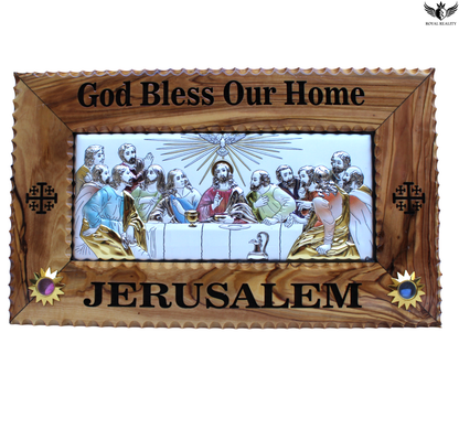 Decorative plaque with religious scene and 'God Bless Our Home Jerusalem' text in a wooden frame.